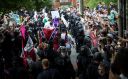 Members of the Ku Klux Klan are escorted out of a planned rally on July 8, 2017 in Charlottesville, Virginia.