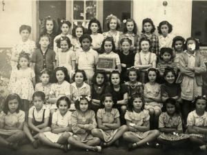 Class photo of young girls a school in Saint Eugene, Algeria.