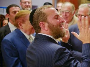 Sheldon and Shmuley: Shmuley Boteach speaks alongside casino mogul Sheldon Adelson at a Yeshiva University panel.