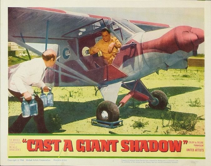 Cast a Giant Siphon: Frank Sinatra prepares to get his shipment of seltzer bottles in ‘Cast a Giant Shadow.’