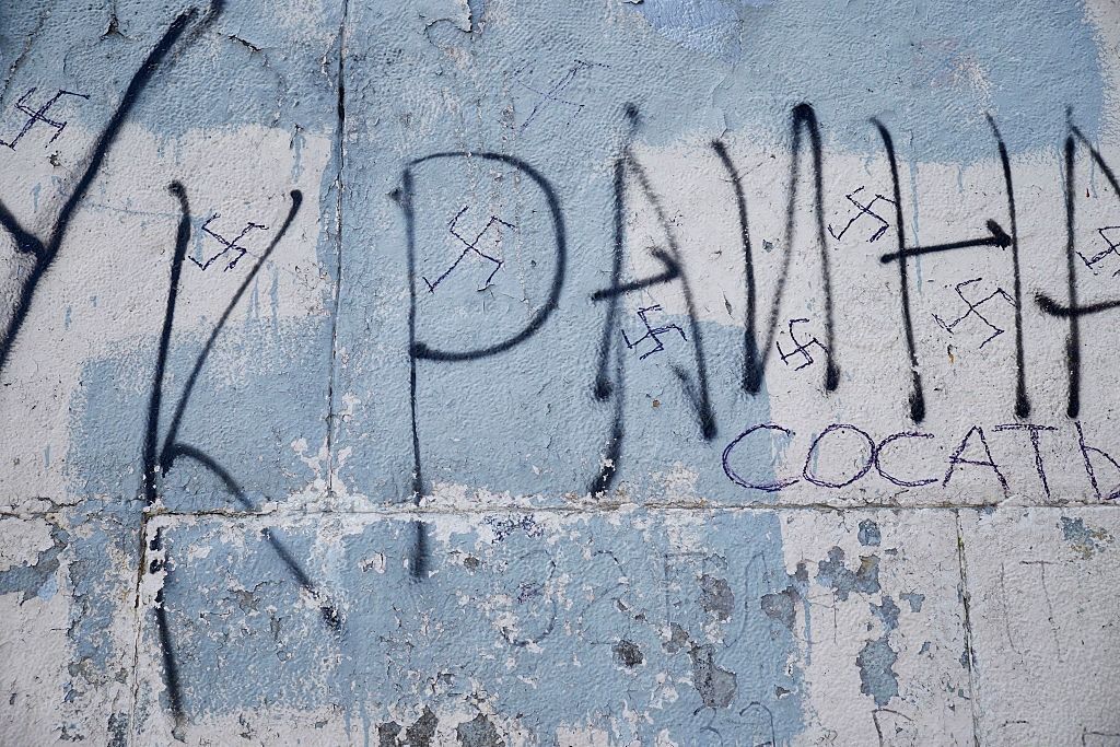 Swastikas drawn on the statue of Lenin in Odessa, Ukraine on April 23, 2015. (Photo by Pierre Crom/Getty Images)